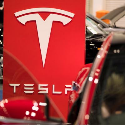 Tesla share dividend and yield